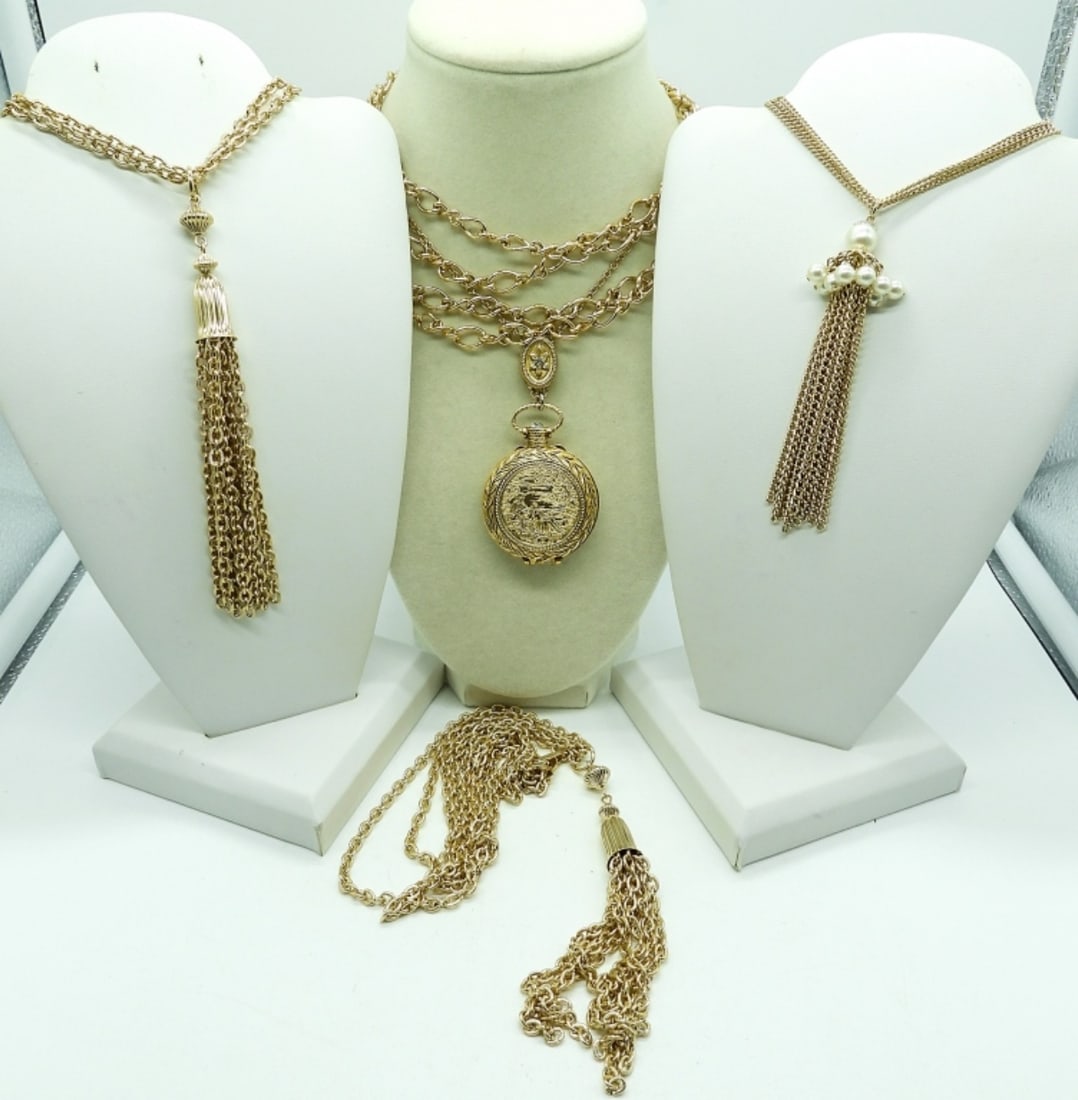 Vintage Perfume Pocket Watch & More (5): Vintage gold tone Perfume Pocket Watch (Empty) 30". Gold tone 30" chain. Three Gold Tone Tassel Necklaces, One with faux pearls, all are 24".