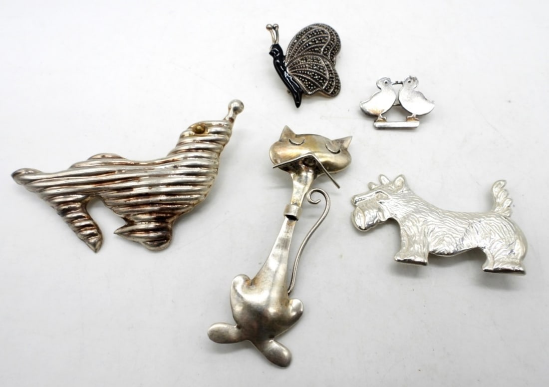 (5) ANIMAL STERLING BROOCHES: 28.4DWT, 1- CAT 2 1/2" STAMPED MEXICO TAXCO 925, 1- SEAL 2 1/2" LONG STAMPED TS-01 925, 1-MARCASITE BUTTERFLY STAMPED STERLING,1" LONG, 1- DOG 2IN" LONG STAMPED STER, 1- BABY CHICKS STAMPED STERLING D