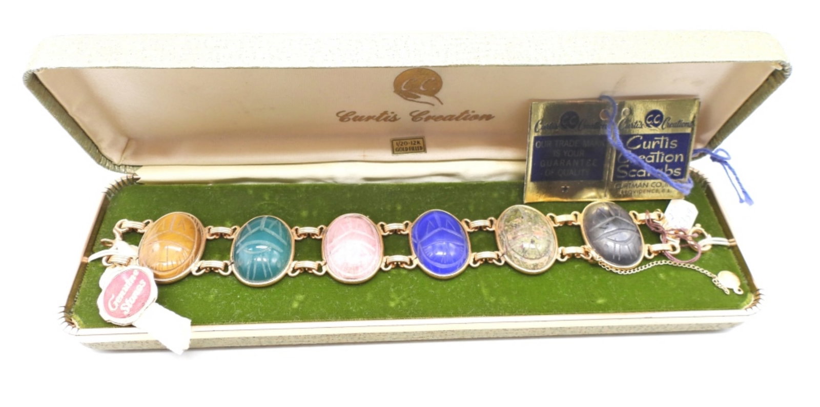 925 Gold Filled Curtis Creation Bracelet: Vintage Curtis Creation Scarab Beetle Carved natural stone bracelet. 7 inches. Clasp works, but safety chain is broken. In original box with hang tag. Great vintage piece! (DWT 25.6)