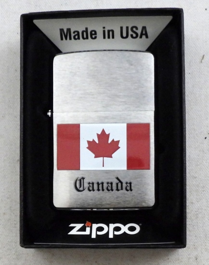 2010 SEALED CANADA ZIPPO LIGHTER: IN THE BOX, SEALED, HAS CANADA FLAG ON THE FRONT