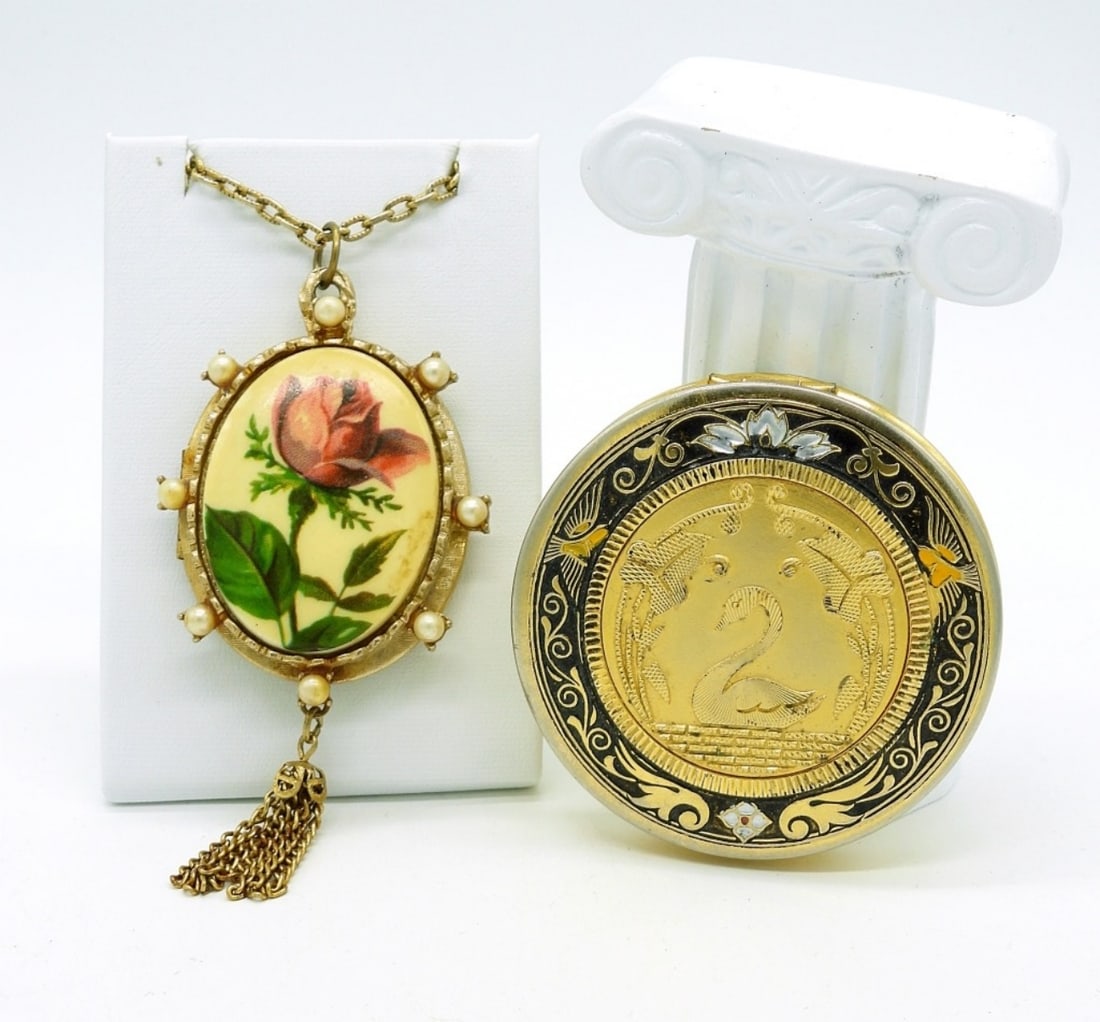 Vintage Compact & Locket: Vintage Gold Tone Swan Compact, measures 2 1/2". Vintage Daytime Nighttime Jewelry by Blair Rose Locket on a 24" chain. Locket measures 2"x 1.5".