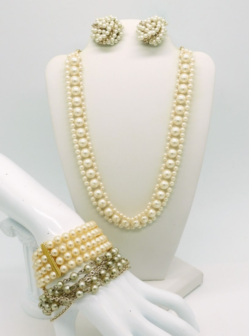 Vintage Faux Pearl Set: Gold tone and silver tone Vintage faux pearl jewelry. Two Bracelets, 7". One Pair of Clip on Faux pearl earrings. One Faux pearl Choker style necklace with gold tone accents, 16" adjustable.