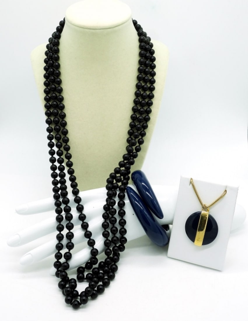 Vintage 1980's Necklaces & Bracelet: Vintage gold tone black beaded necklace circal 1980s with large gold/black & faux pearl clasp. 30". Matching gold tone & Navy Blue Tusk style bracelet and chunky round navy blue pendant on a 30" chain