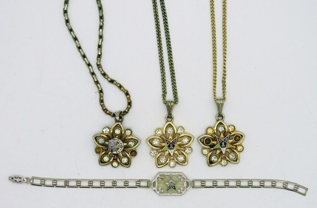 Masonic - Daughters of Rebekah Jewelry - 4 Pieces: Two Starburst Pendants with the Masonic Icon in gold tone, chains are 19". One Starburst pendant with the Daughters of Rebekah Icon in gold tone, chain is 16". Silver tone Etched Glass Bracelet with t