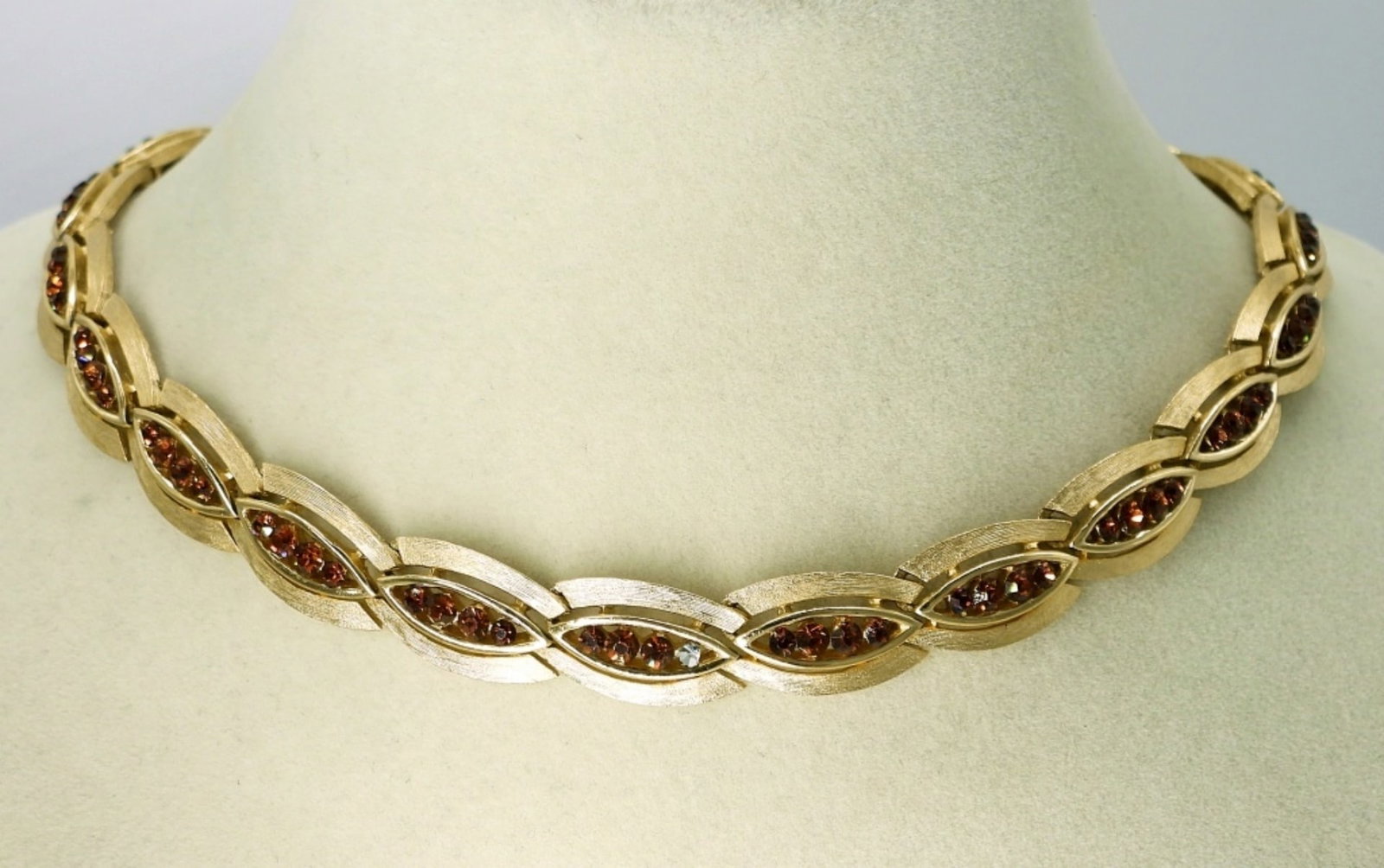 Trifari Rhinestone Brushed Gold Tone Necklace: Vintage Trifari, Topaz Colored Rhinestone, Brushed Gold Tone Necklace, 16" adjustable. Missing One Small Rhinestone.