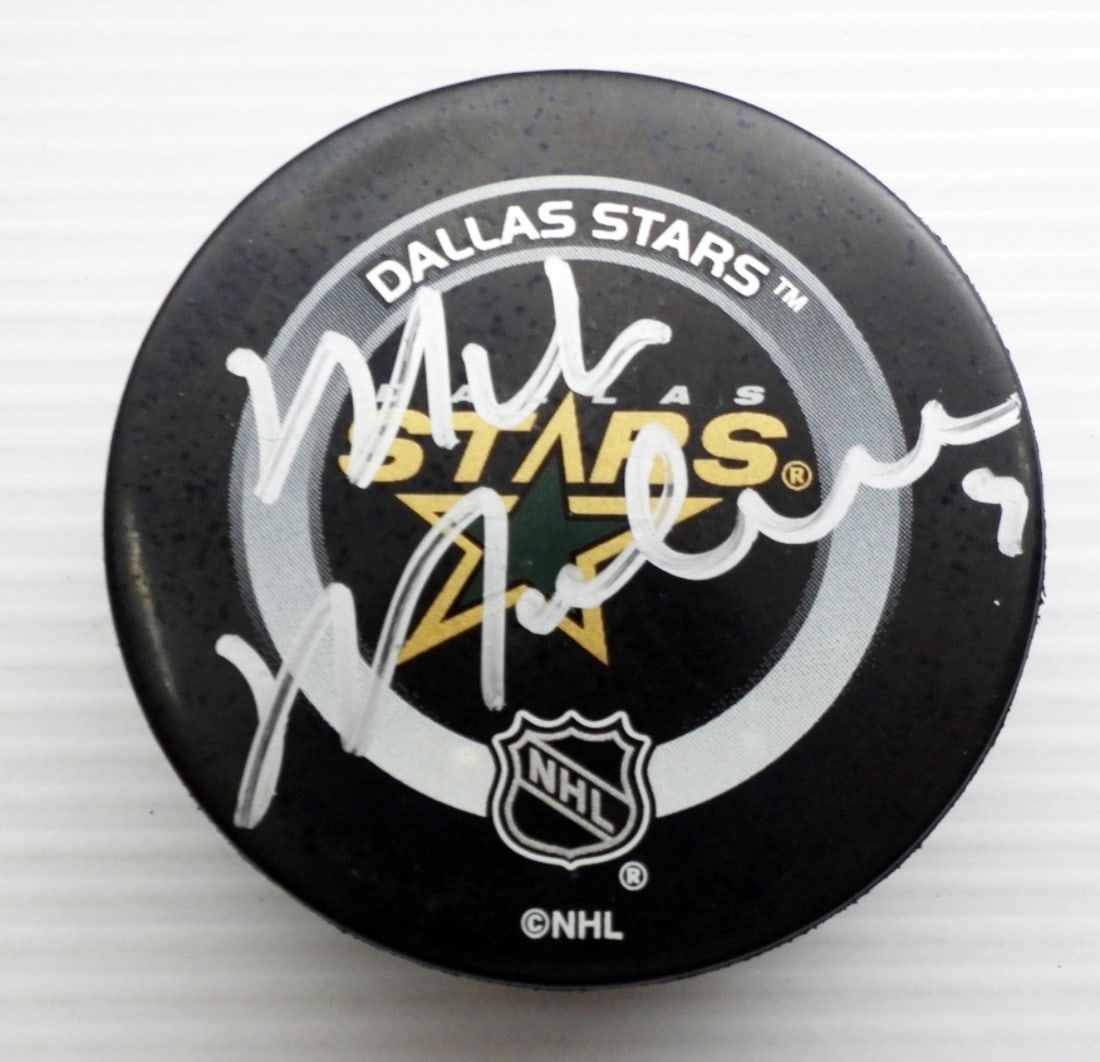 MIKE MODANO SIGNED HOCKEY PUCK (1 of 2)