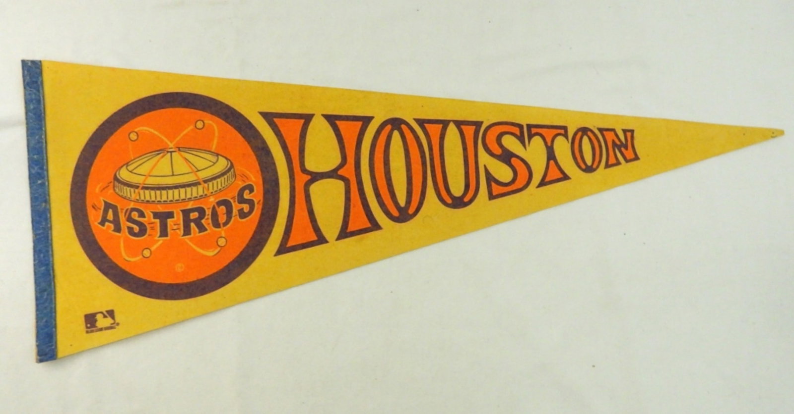 VINTAGE HOUSTON ASTROS PENNANT: 30X12, DOES HAVE FADED FROM THE YEARS AND DOES HAVE PIN HOLES IN SOME SPOTS, IN A PENNANT SLEEVE