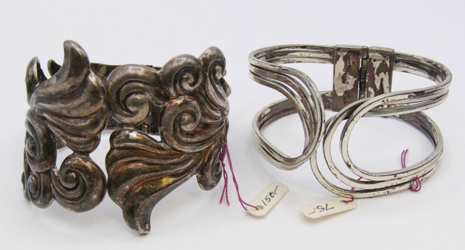 (2) MEXICO STERLING HINGE CUFF BRACELETS: 70 DWT. 2.25" CUFFS BOTH STAMPED "STERLING" INSIDE.