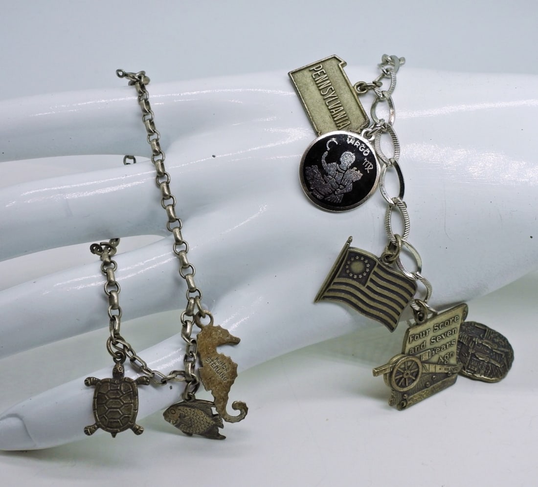 2 Vintage Sterling Charm Bracelets: Two Vintage Sterling Charm Bracelets. 6" & 7", Eleven Charms. 23.5 DWT