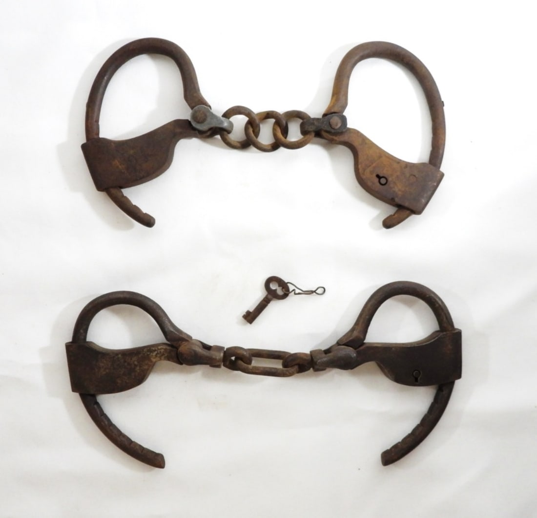 (2) ANTIQUE IRON HANDCUFFS w/KEY (1 of 2)