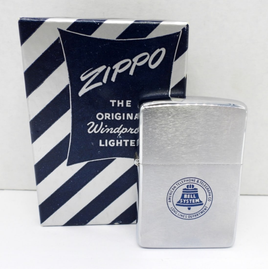 1965 UNFIRED ADVERTISING "BELL" ZIPPO (1 of 4)