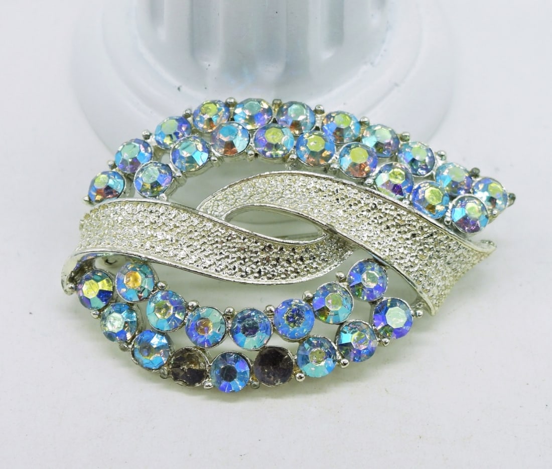 Coro Vintage Brooch: Vintage Silver Tone CORO Rhinestone Brooch. Missing 2 Rhinestones. 2"x 1.5".