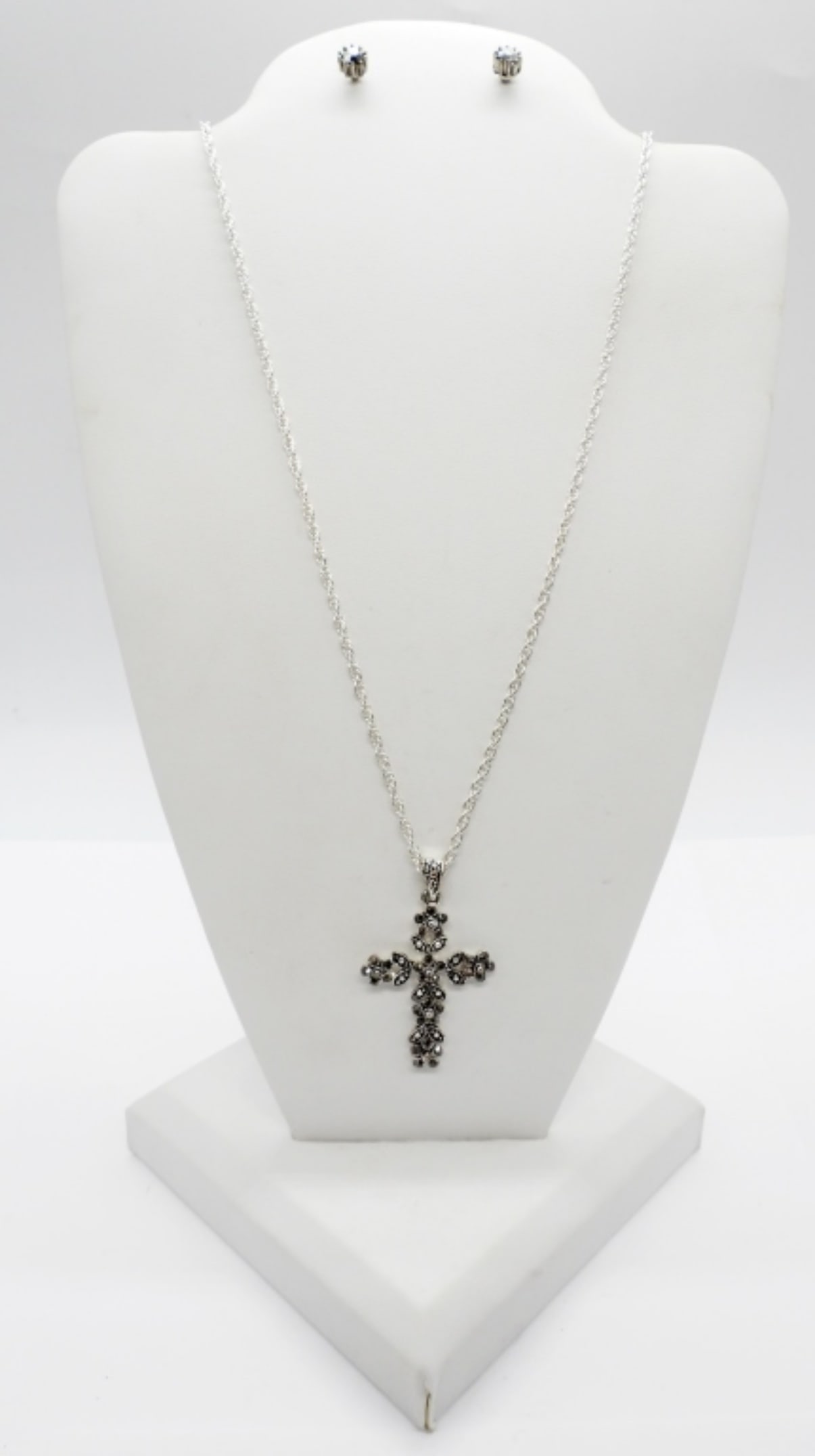 Marcasite Cross Set: Marcasite Silver Tone Cross Necklace, 18-21" adjustable and a pair of silver tone Marcasite Stud Earrings.