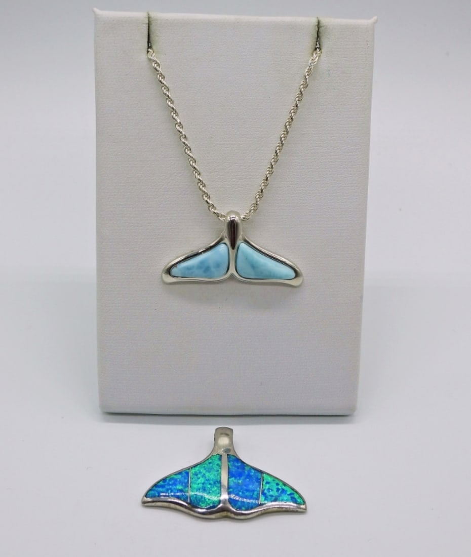 2 WHALE TAIL PENDANTS 925 - LARIMAR: STERLING WHALE TAIL LARIMAR PENDANT ON A 21" STERLING CHAIN. STERLING WHALE TAIL WITH SYNTHETIC OPAL INLAY. 12.9 DWT