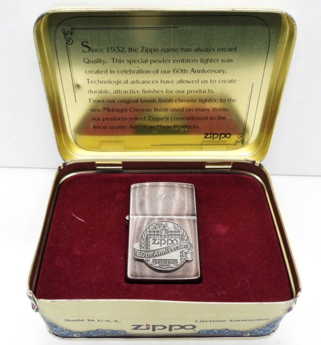 1932-1992 FIRED 60TH ANNIVERSARY ZIPPO LIGHTER: FIRED, IN ITS ORIGINAL TIN BOX, ENGRAVED ON TOP "I LOVE YOU, PAULA", EVEN HAS A NOTE WITH LITTE KEEPSAKES