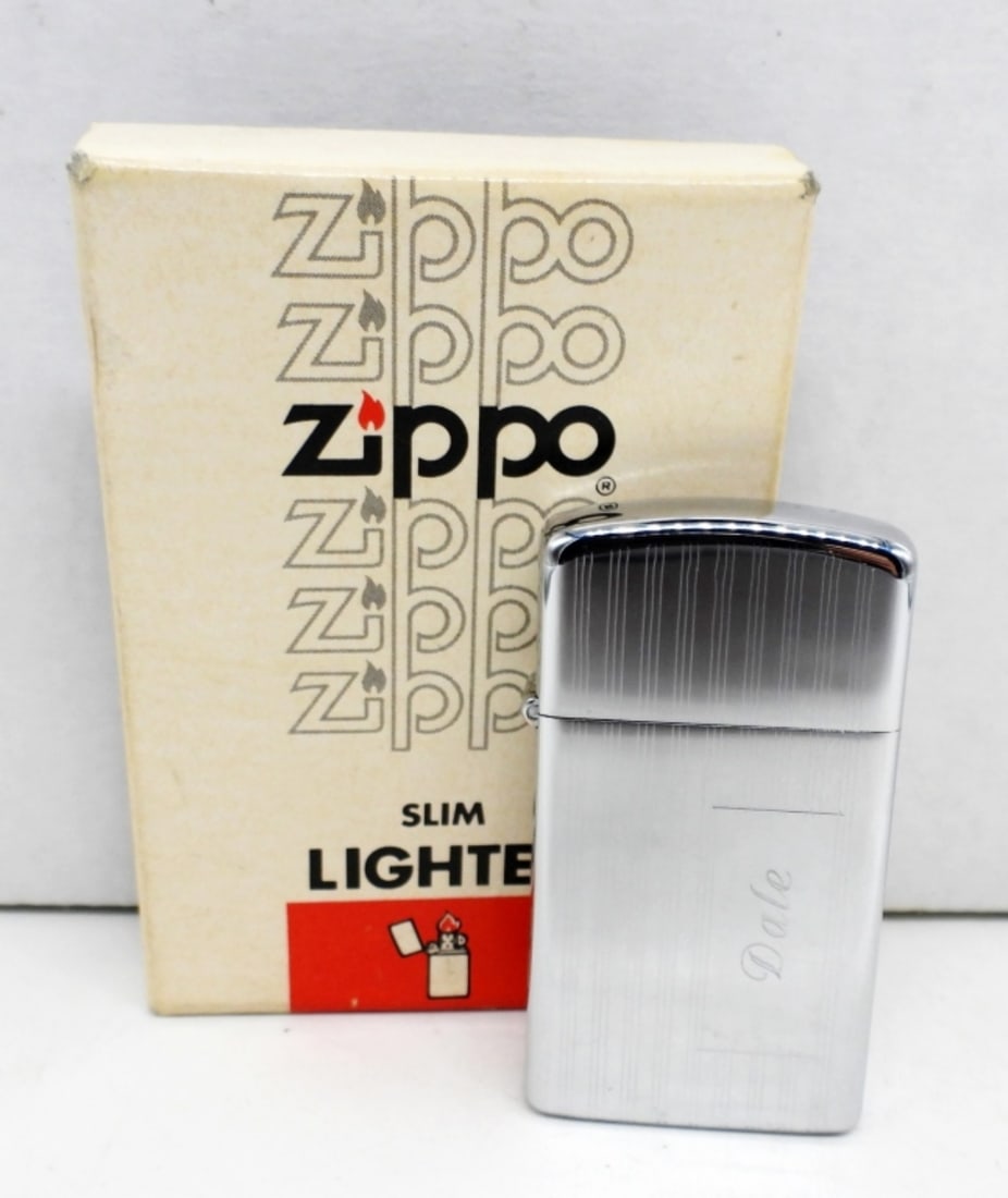 1978 UNFIRED SLIM ZIPPO ENGRAVED: UNFIRED, ENGRAVED "DALE", WITH EITCHED LINE DESIGN, IN A ZIPPO BOX(BOX CORNER COMING APART)