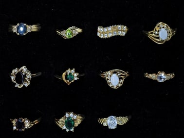 11 GOLD TONE FASHION RINGS