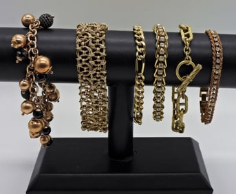 6 GOLD TONE FASHION BRACELETS
