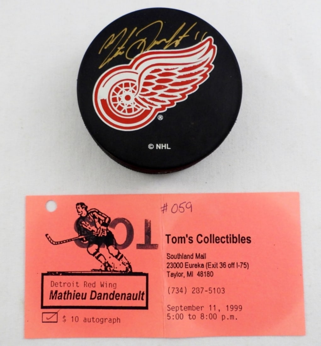 MATHIEU DANDENAULT NHL RED WINGS AUTOGRAPH PUCK (1 of 2)