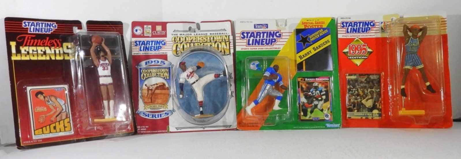 4 CT VARIETY OF STARTING LINEUP FIGURES: KAREEM ABDUL JABBAR, SHAQUILLE ONEAL, BARRY SANDERS, COOPERSTOWN COLLECTION SATCHEL PAIGE