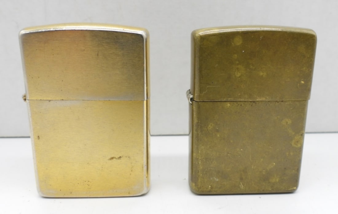 (2) FIRED GOLD TONE ZIPPOS: BUT FIRED 1996 AND 1998
