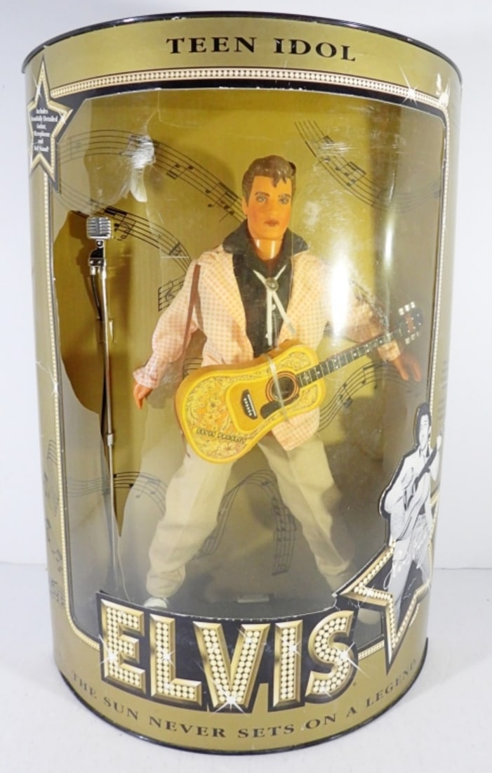 1993 HASBRO ELVIS TEEN IDOL DOLL IN BOX: MISSING CELLO ON THE FRONT OF THE BOX, THE DOLL IS IN GREAT CONDITION, AND INCLUDES A GUITAR, MICROPHONE, AND DOLL STAND