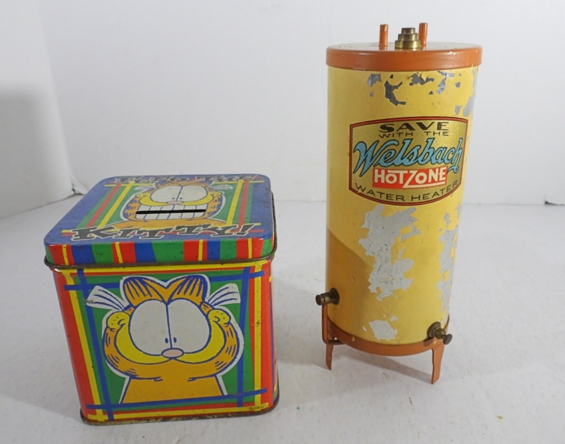 2 VINTAGE COIN BANKS (1 of 5)
