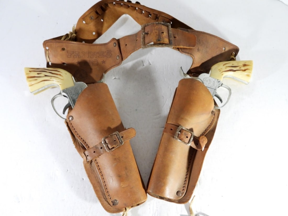 FANNER 50 COWBOY CAP GUNS & HOLSTER: WITH BELT - WORKING CONDITION