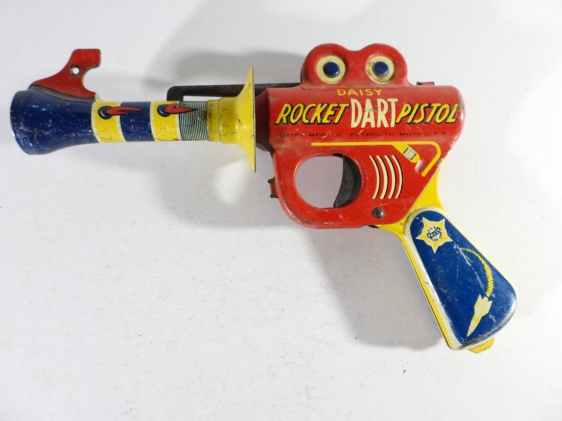DAISYROCKET DART PISTOL SPACE GUN: PLAY GUN - DOESN'T REALLY DO ANYTHING WHEN TRIGGER PULLS?