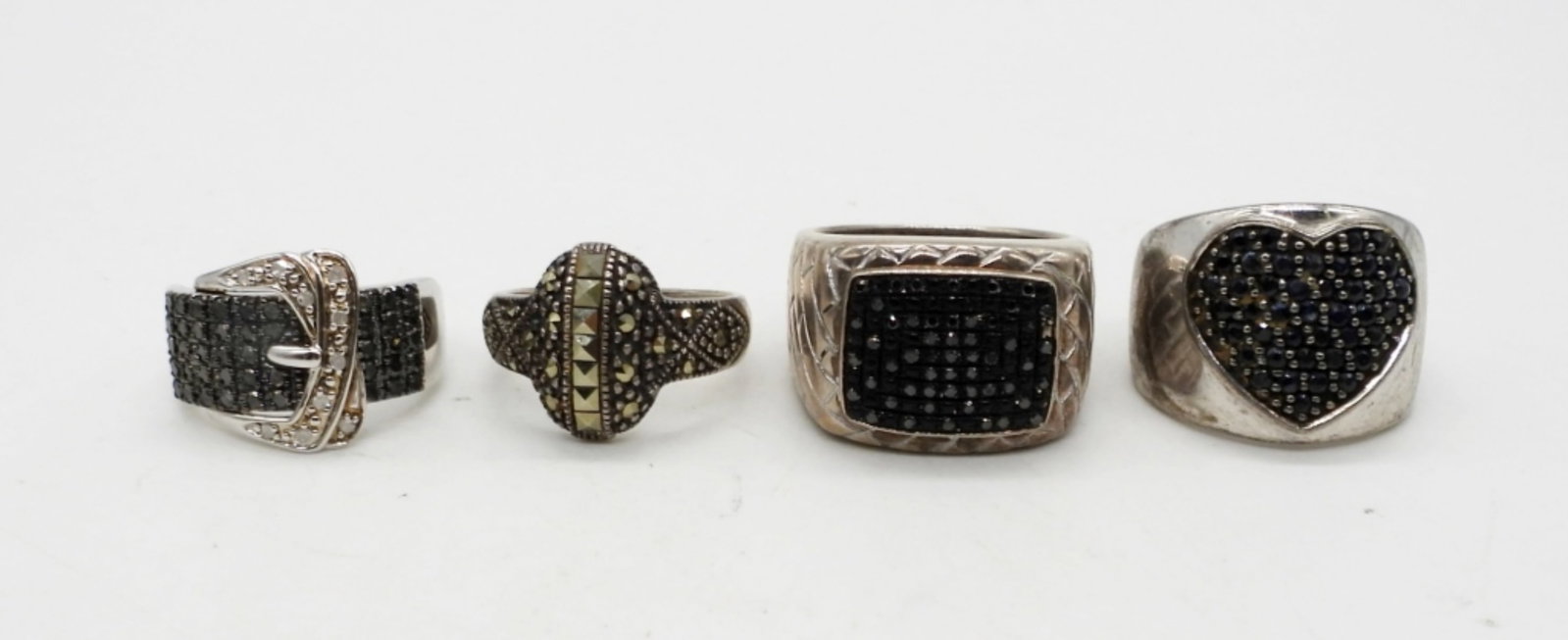 (4) STERLING MARCASITE FASHION RINGS: STAMPED 925 - SIZES 8 & 10 - 21.5 DWT
