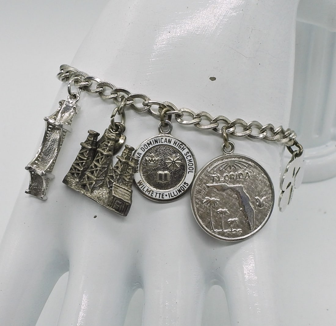 Vintage Sterling Charm Bracelet: Vintage Sterling Charm Bracelet with 10 Charms. 7", 18.1 DWT