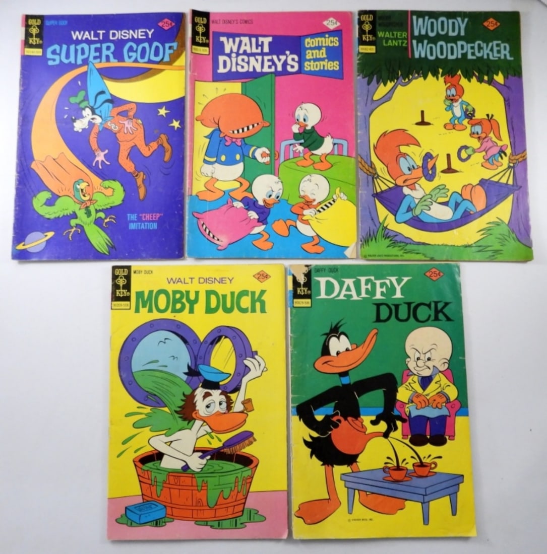 (5) VINTAGE 25c GOLD KEY COMIC BOOKS: INCLUDES SUPER GOOF, WOODY WOODPECKER, MOBY DUCK & MORE - GOOD CONDITION