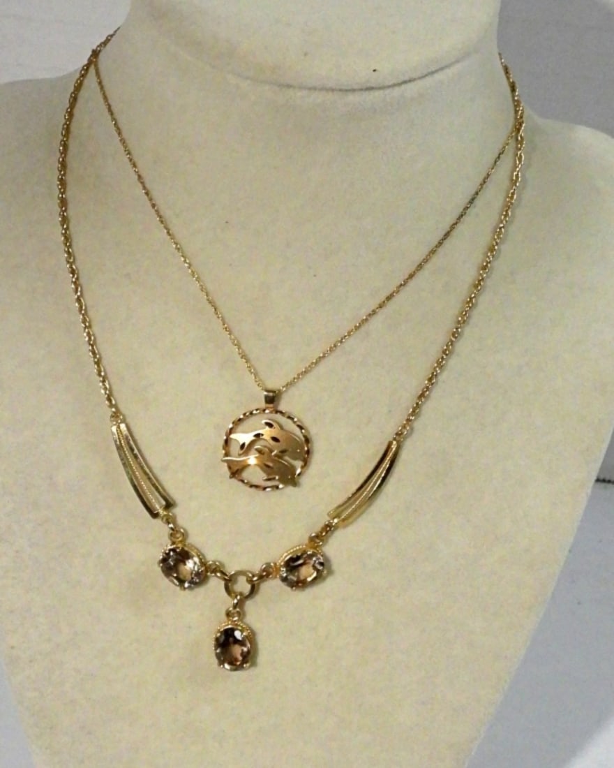 2 GOLD FILLED FASHION NECKLACES: GOLD TONE/ 14KGF DOLPHIN PENDANT AND CHAIN, 18". GOLD TONE / 12KGF NECKLACE WITH 3 GEMSTONES 14".