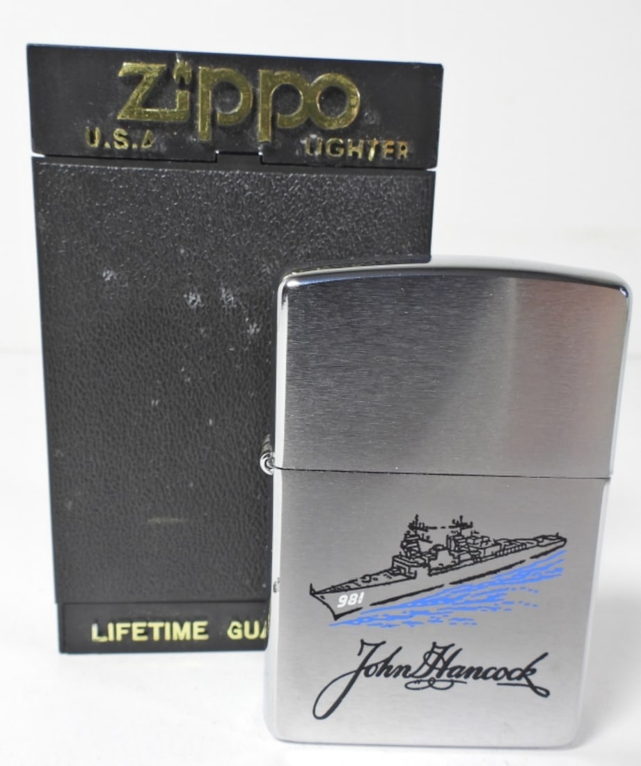 1991 UNFIRED USS JOHN HANCOCK ZIPPO: JOHN HANCOCK SHIP ON ONE SIDE, THE OTHER USS JOHN HANCOCK DD-981 LOGO, IN A ZIPPO BOX