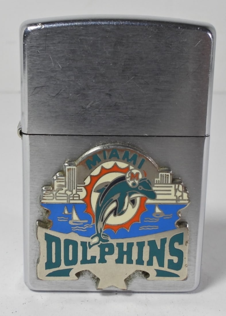 04 FIRED MIAMI DOLPHINS ZIPPO: MIAMI DOLPHINS LOGO ON THE FRONT,