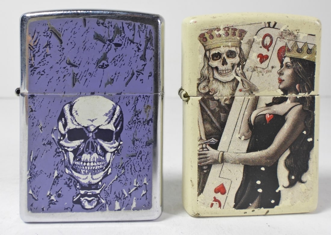 (2) SKULL ZIPPO LIGHTERS: 1- PURPLE SKULL 2006- UNFIRED, 1- 2020 KING SKULL, FIRED