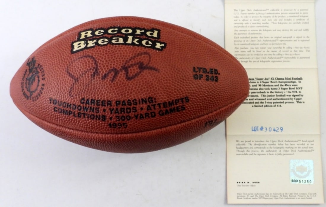 JOE MONTANA SIGNED MINI FOOTBALL: IN GREAT CONDITION COMES WITH BOX AND COA