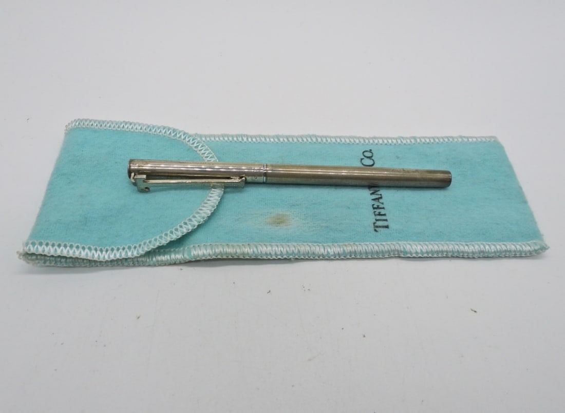TIFFANY & CO INK PEN STERLING: STERLING TIFFANY & CO MINI INK PEN WITH A "T" ON IT. MARKED 925. 10 DWT