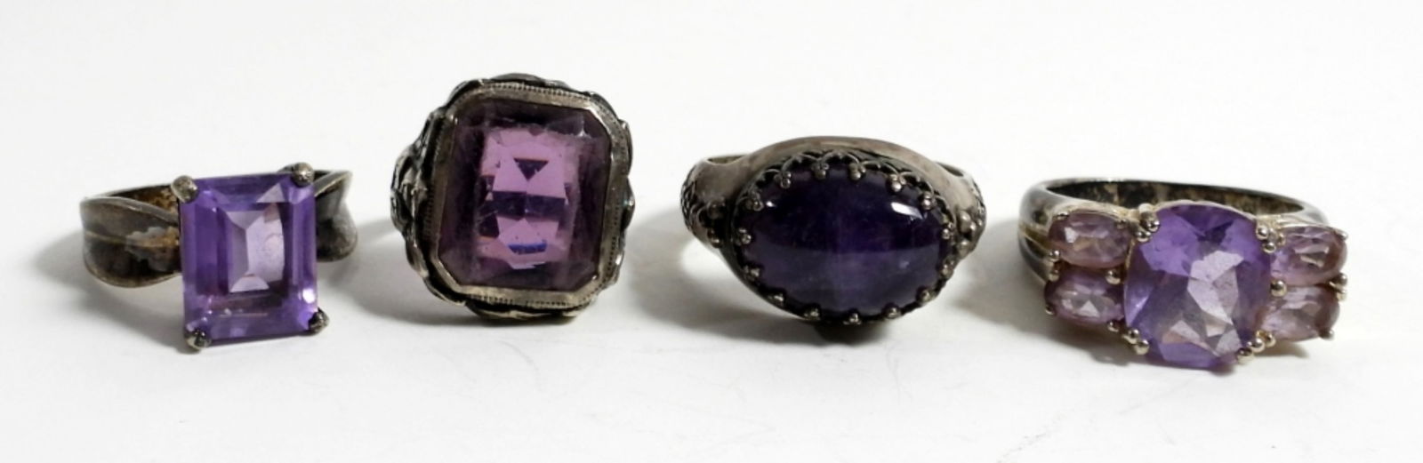 (4) STERLING SILVER & PURPLE STONE RINGS (1 of 3)