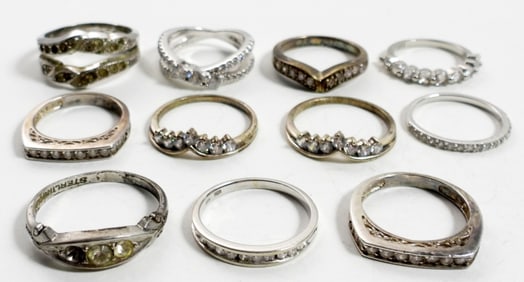 (11) STERLING & CLEAR GEMSTONE RINGS