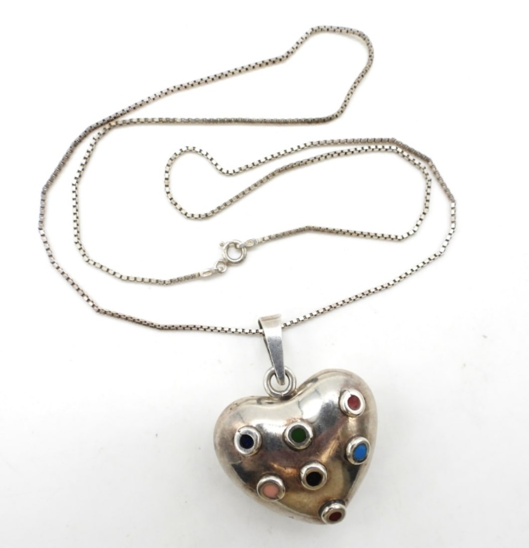 STERLING HEART HARMONY PENDANT: STERLING HEART HARMONY PENDANT, HEART IS 1.5"x1.5" WITH A 24" STERLING CHAIN. 21.7 DWT