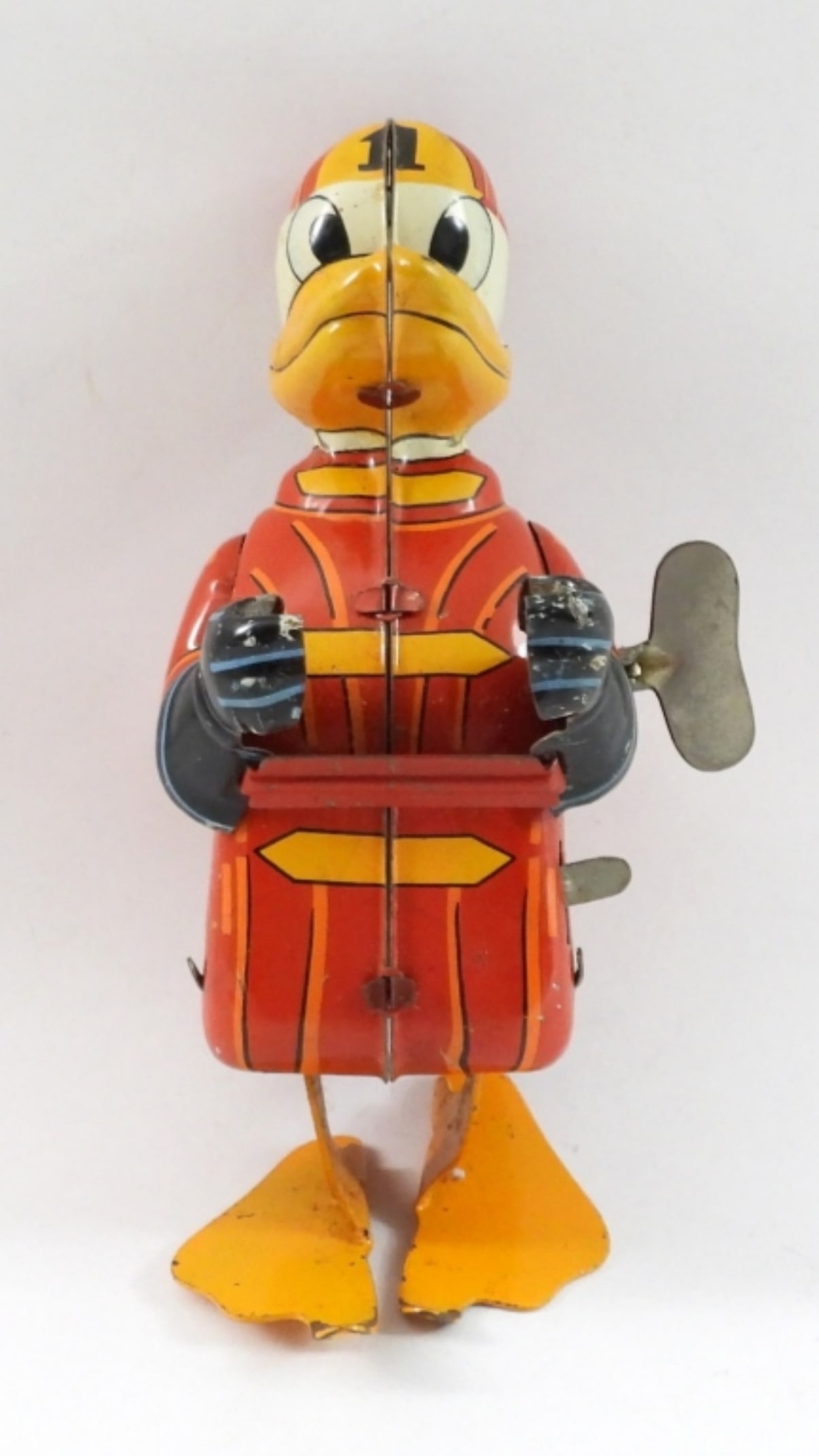 MARX WALT DISNEY TIN WIND-UP DUCK: FIREMAN - WORKING CONDITION but DOESN'T WANT TO BALANCE to STAND UP & MISSING HAT RIM