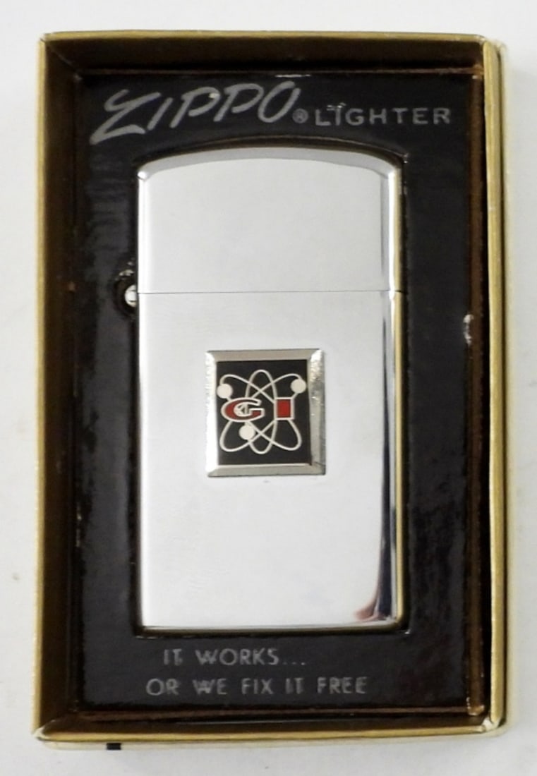 VINTAGE 1974 UNFIRED ZIPPO: VINTAGE 1974 UNFIRED ZIPPO LIGHTER WITH LOGO ON FRONT,IN ORIGINAL BOX