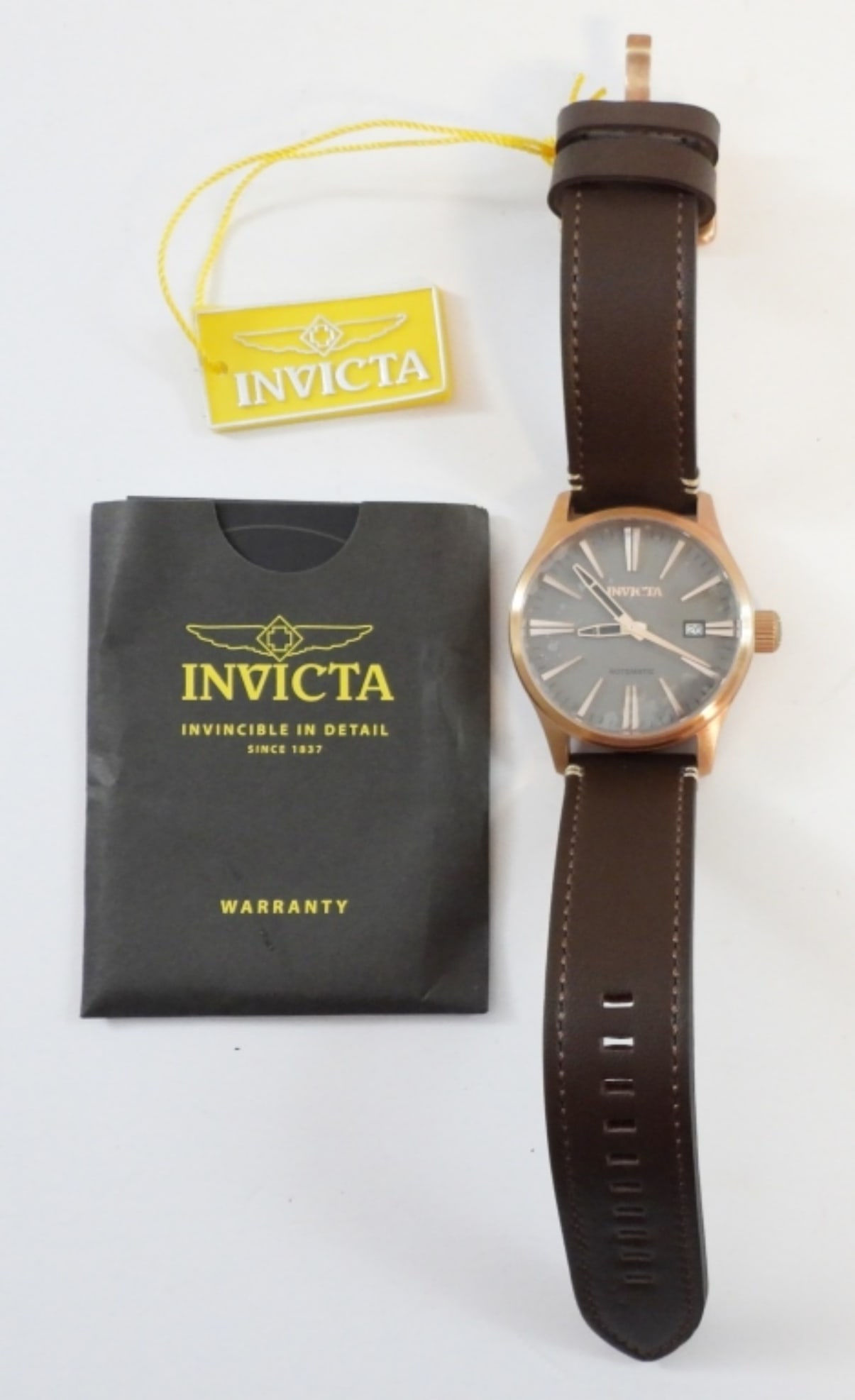 INVICTA AUTOMATIC MEN'S WATCH. ROSE GOLD/LEATHER: INVICTA AUTOMATIC MEN'S WATCH. ROSE GOLD TONE FACE WITH A RICH BROWN LEATHER BAND. #22946 WATER RESISTANT 30M. (CURRENTLY WORKING BUT NOT TESTED)