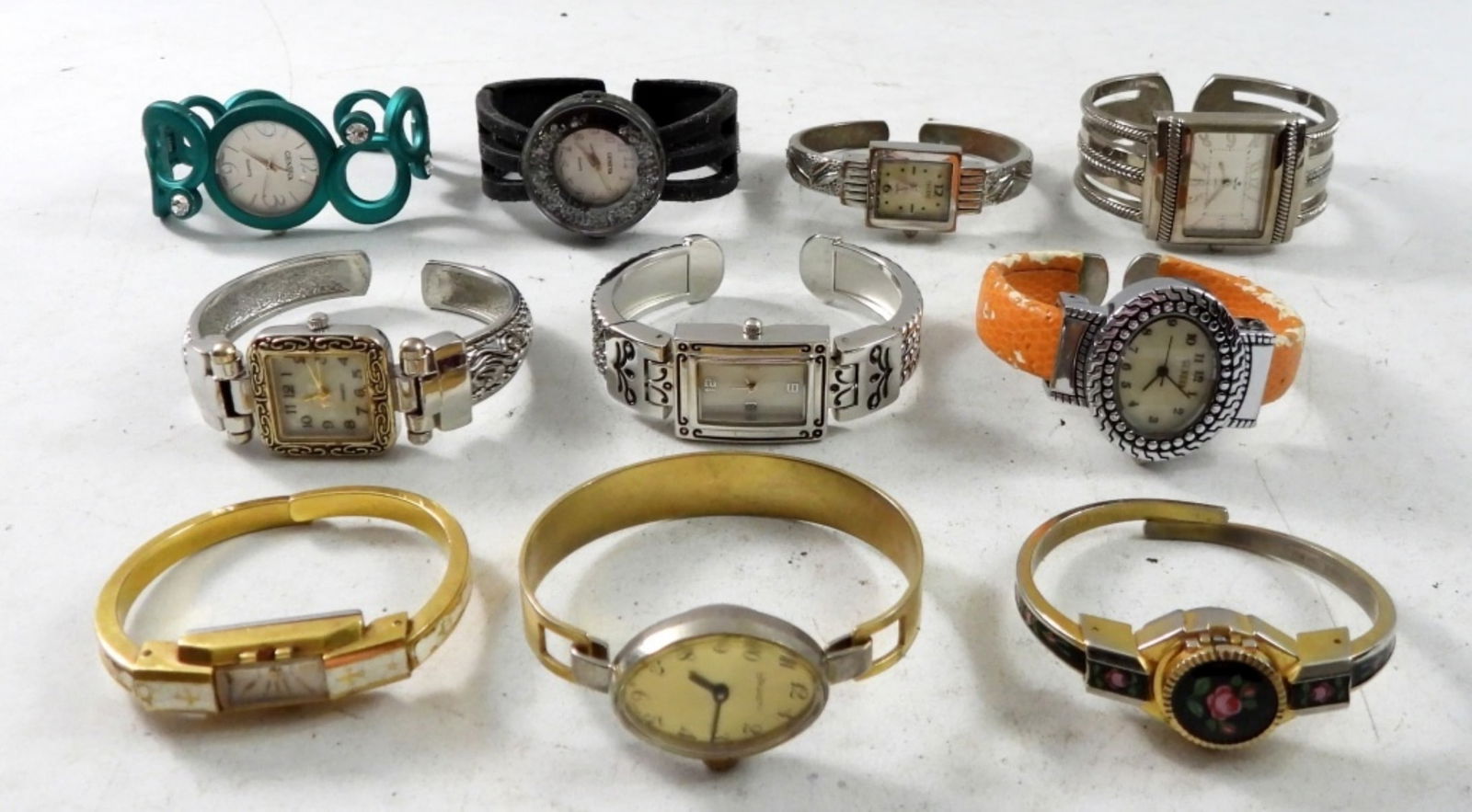 10 VINTAGE LADIES WIND UP CUFF WATCHES (1 of 4)