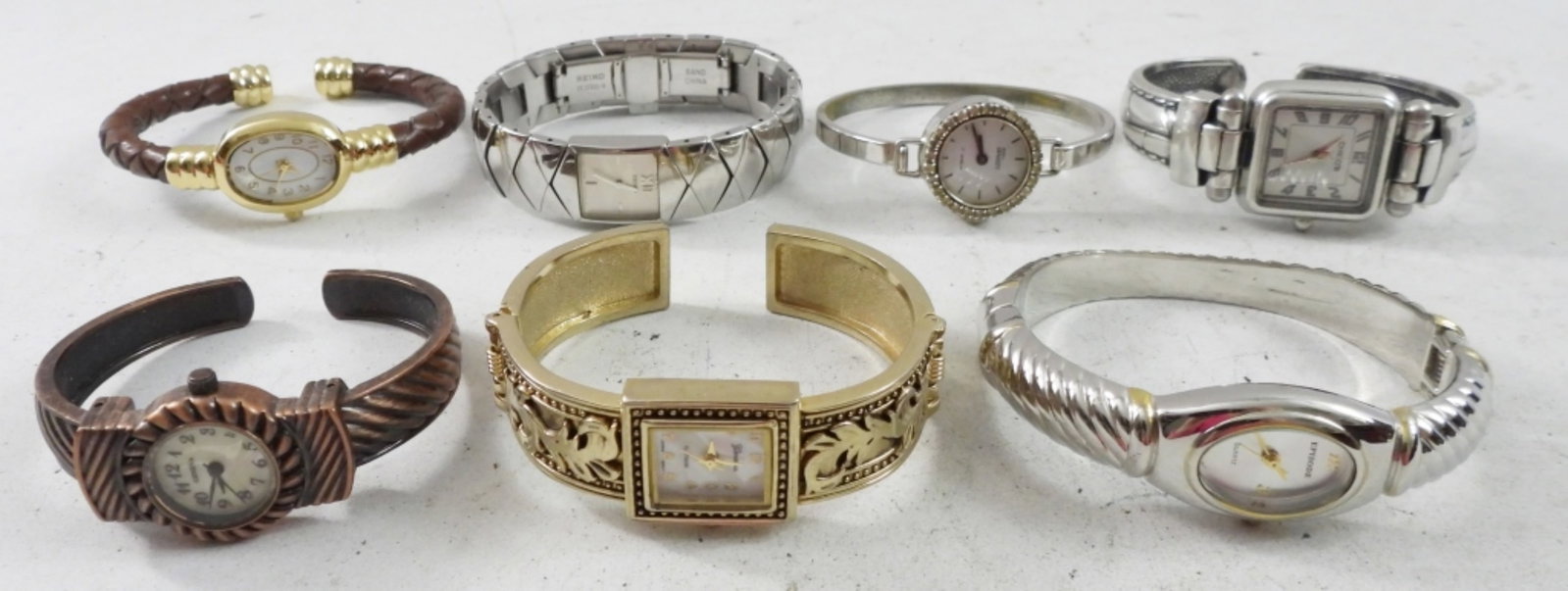 (7) WOMENS BANGLE WATCHES: NOT TESTED AS TO WORKING OR NOT SILVER/GOLD/COPPER TONE