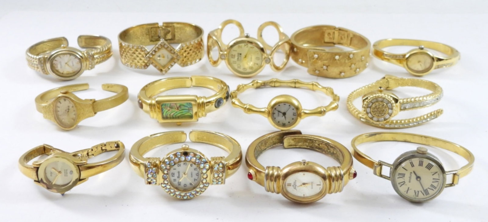 (13)GOLD TONE BANGLE WATCHES: NOT TESTED AS TO WORKING OR NOT