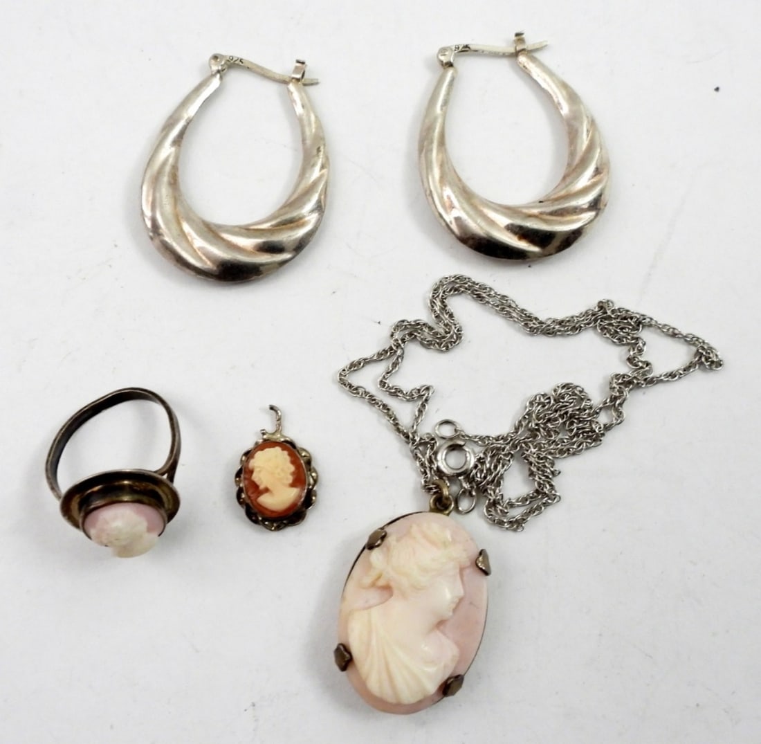LADIES 4 PIECE STERLING CAMEO SET: 18IN STERLING NECKLACE WITH CAMOE, MATCHING CAMEO RING SIZE 5.5,A PAIR OF EARRING AND A BROKEN CAMEO PENDANT( SEE PICTURES) 9.9 DWT