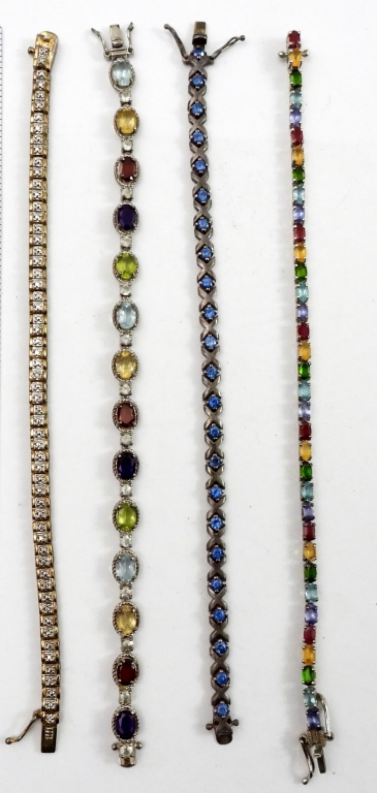 (4) STERLING TENNIS BRACELETS (1 of 2)