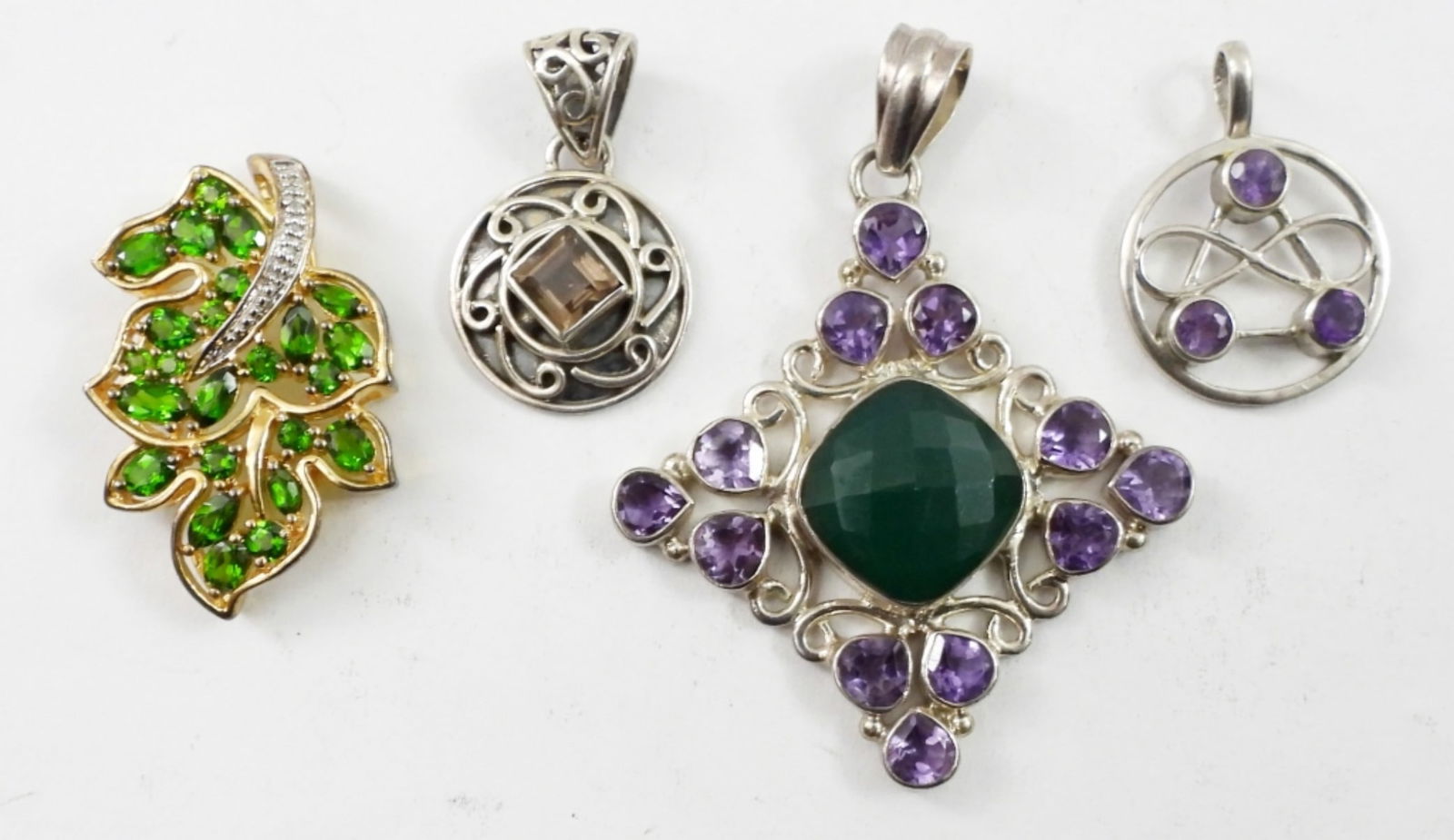 (4) SILVER GOLD TONE PENDENTS (1 of 2)